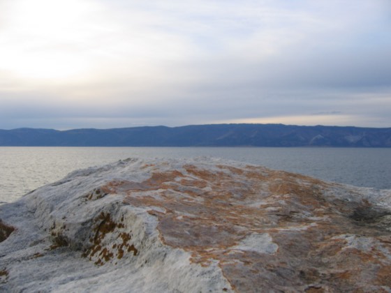 White stone ledge over Baikal at dusk